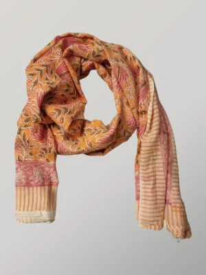 Peachy Keen hand block printed cotton scarf loosely knotted and styled as a lightweight scarf