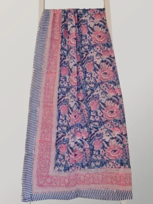 Turkish Delight cotton sarong hanging full length, showing its rich navy with pink and rose florals